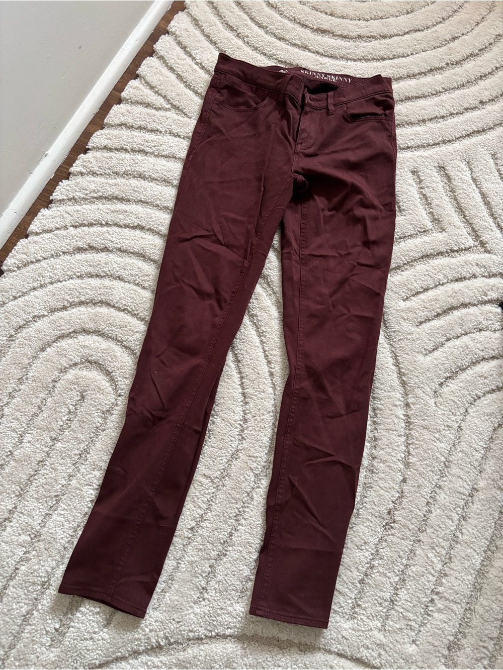 Madewell Super Super Skinny ankle jeans in burgundy / wine color